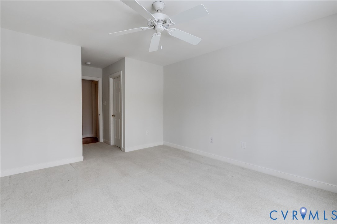 507 Hunt Field Road Manakin-Sabot, VA 23103 - Photo 36 of 43 an empty room with a ceiling fan and a ceiling fan