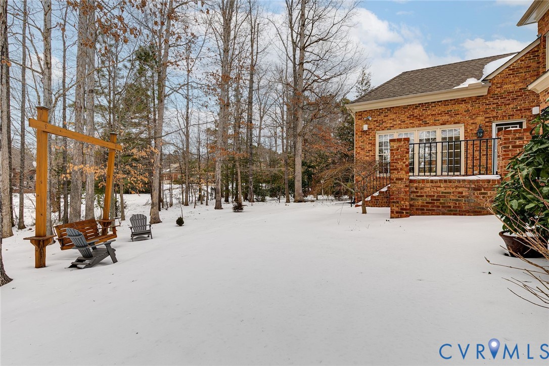 507 Hunt Field Road Manakin-Sabot, VA 23103 - Photo 42 of 43 a view of a building with snow on the road