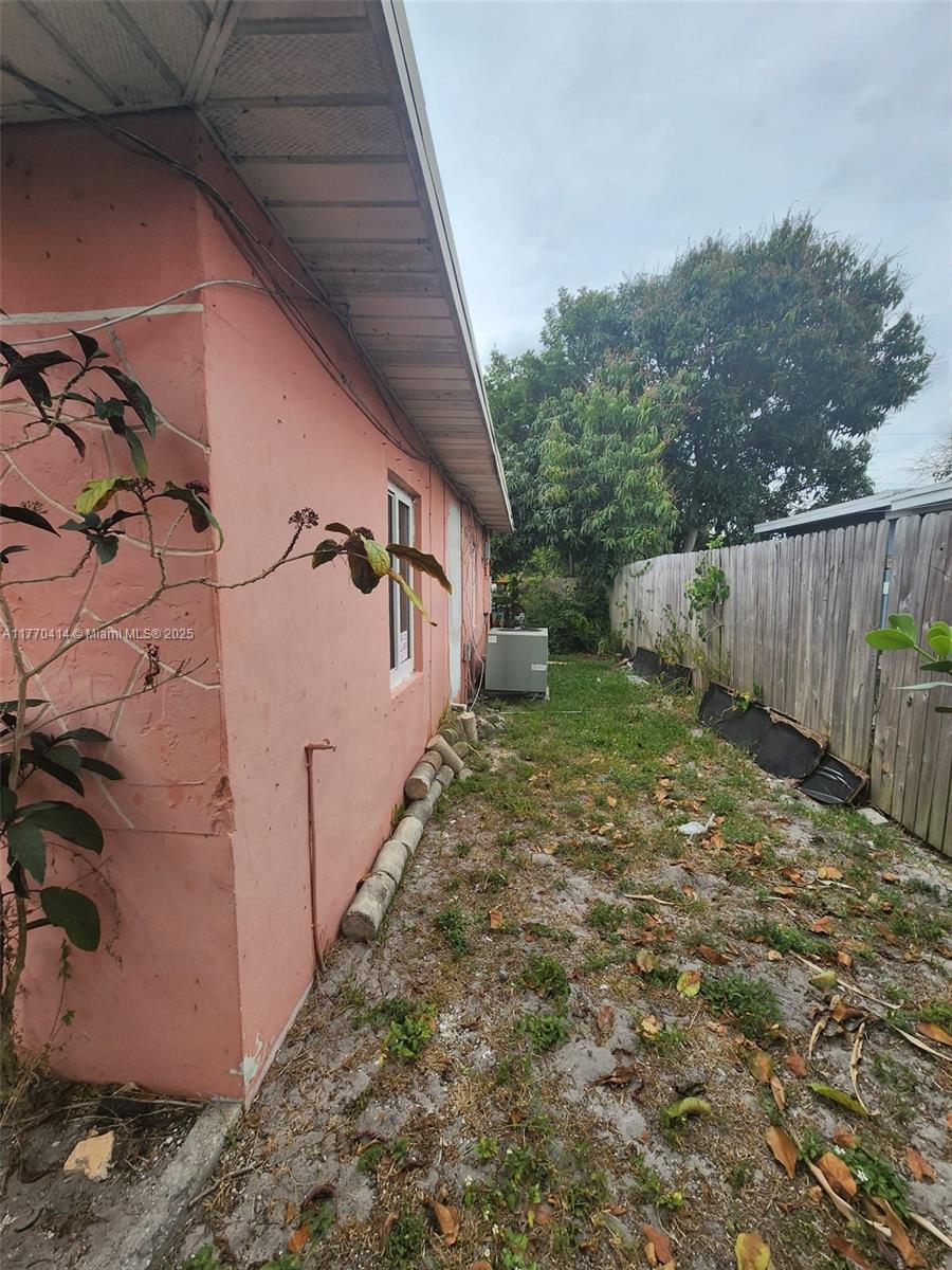 831 Northwest 140th Street Miami, FL 33168 - Photo 18 of 19 a view of a backyard