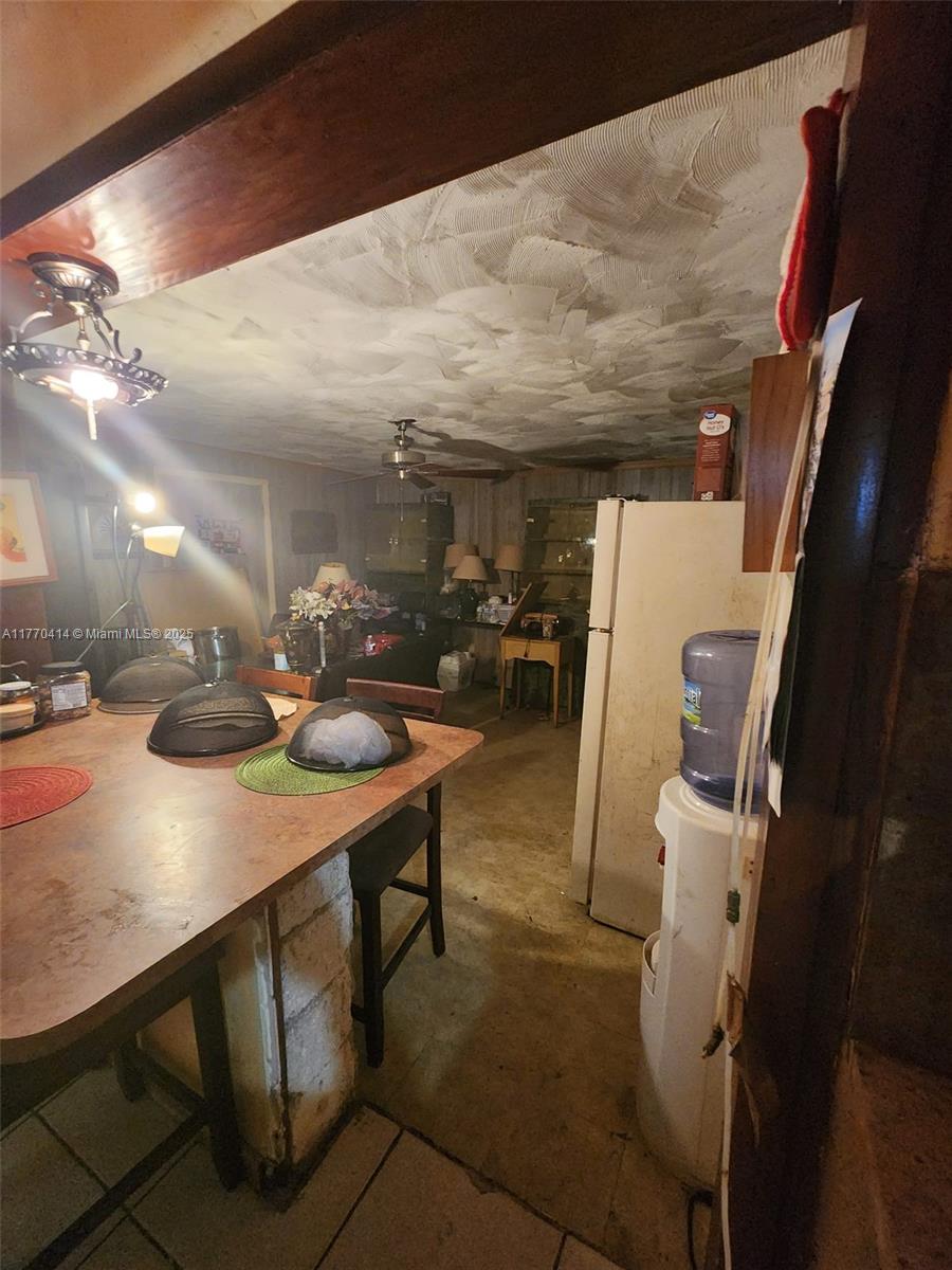 831 Northwest 140th Street Miami, FL 33168 - Photo 6 of 19 a view of a workspace with furniture