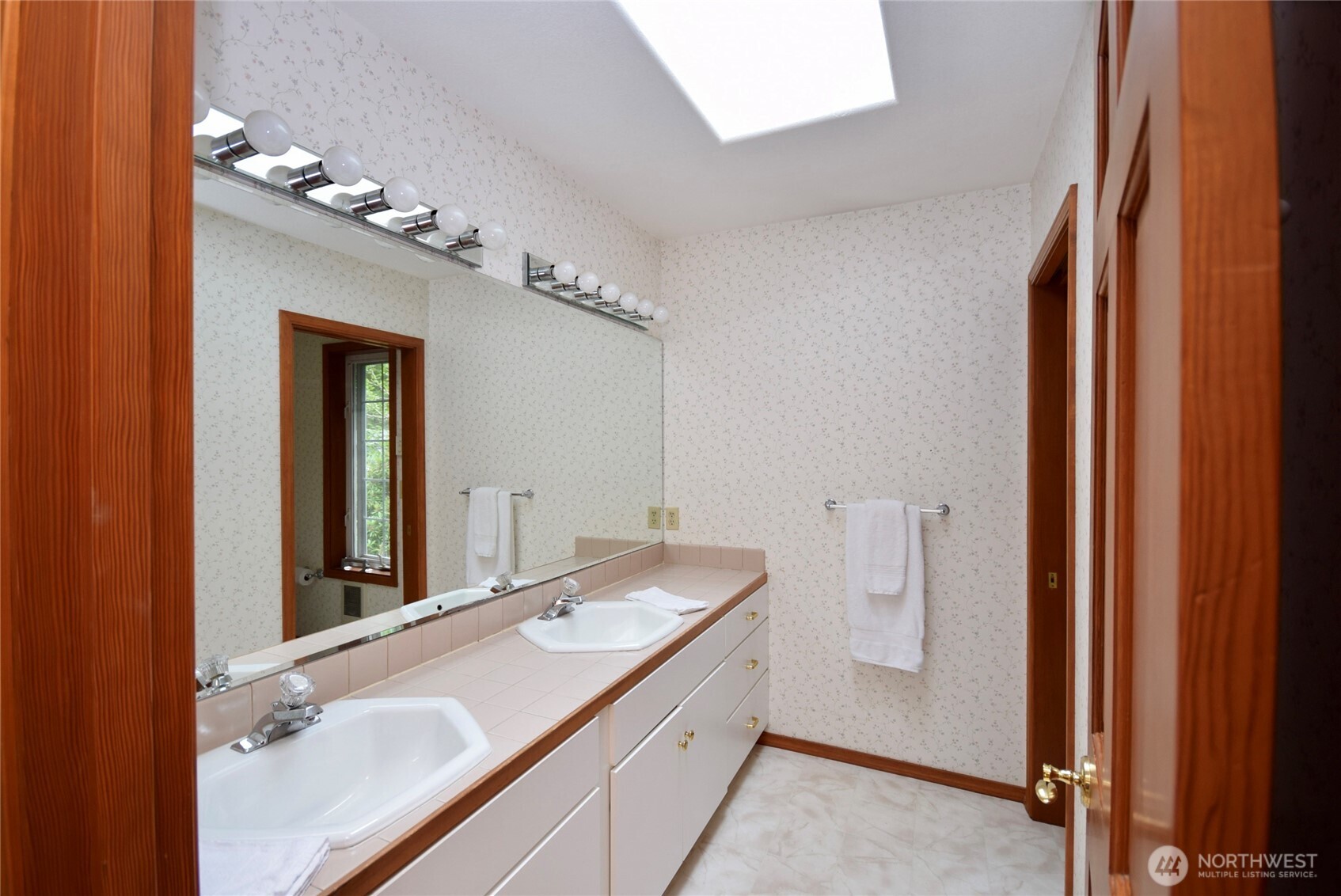 2422 West Sequim Bay Road Sequim, WA 98382 - Photo 26 of 36 a bathroom with a sink and a mirror