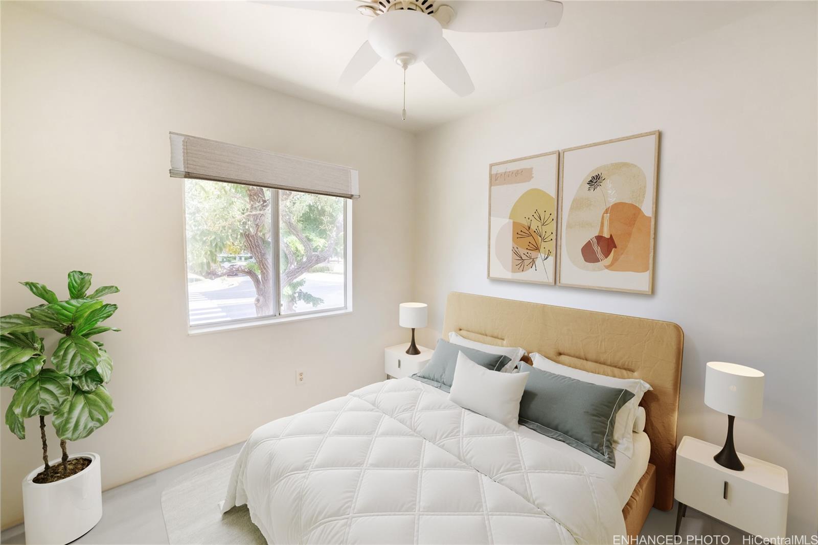 91-1147 Kamaaha Loop, Unit 6F Kapolei, HI 96707 - Photo 13 of 25 a bedroom with a bed and a window