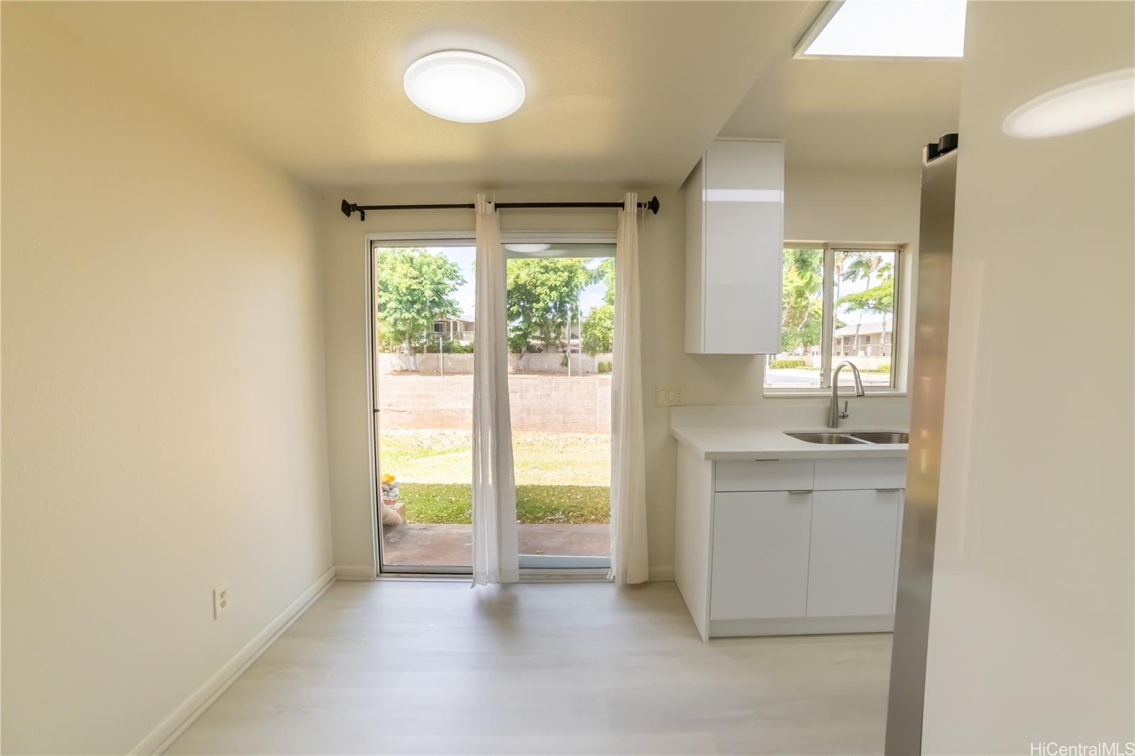 91-1147 Kamaaha Loop, Unit 6F Kapolei, HI 96707 - Photo 7 of 25 a view of an empty room with a window