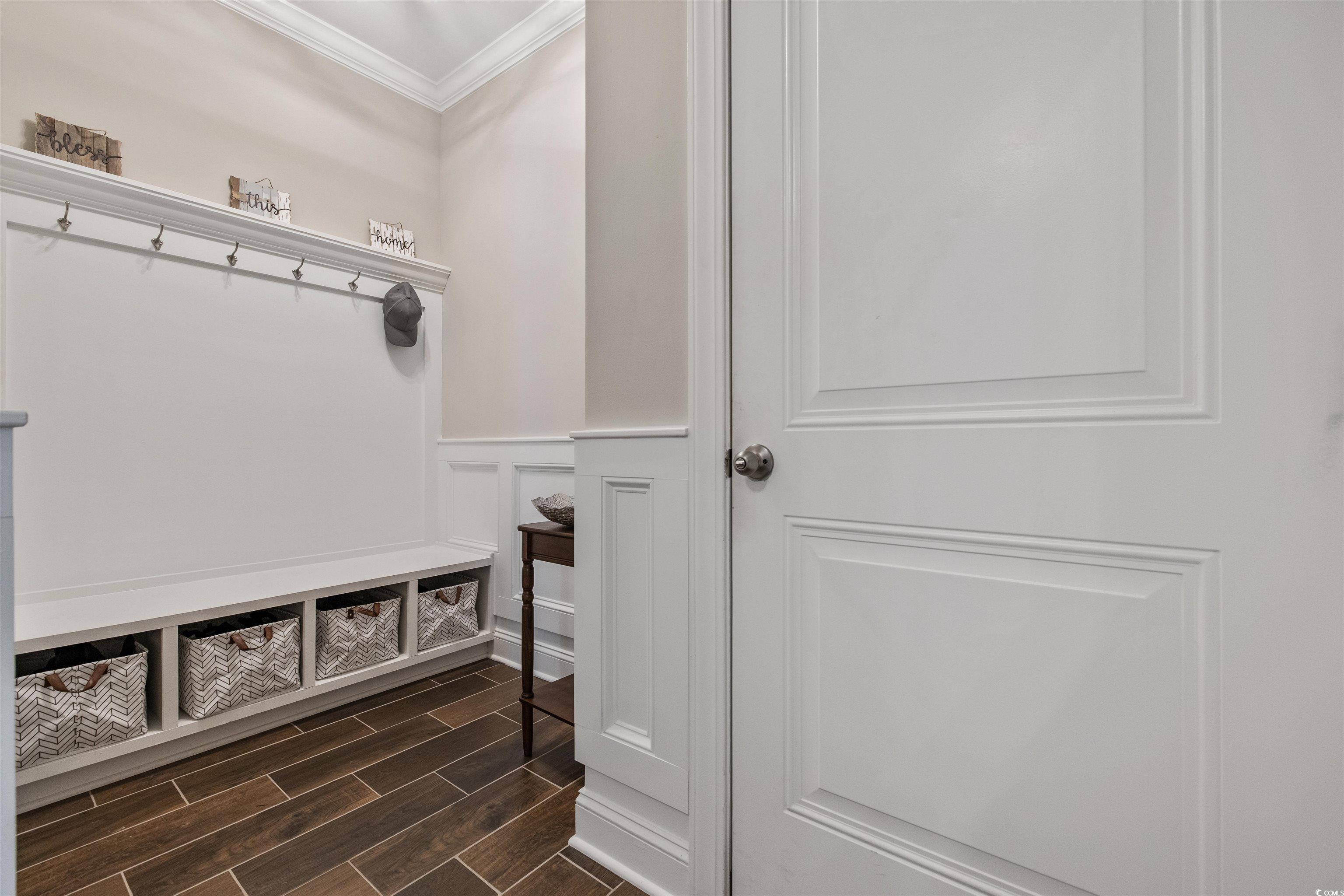 5286 Stockyard Loop Myrtle Beach, SC 29588 - Photo 25 of 40 Mudroom featuring wood tiled floors, crown molding, a decorative wall, and a wainscoted wall