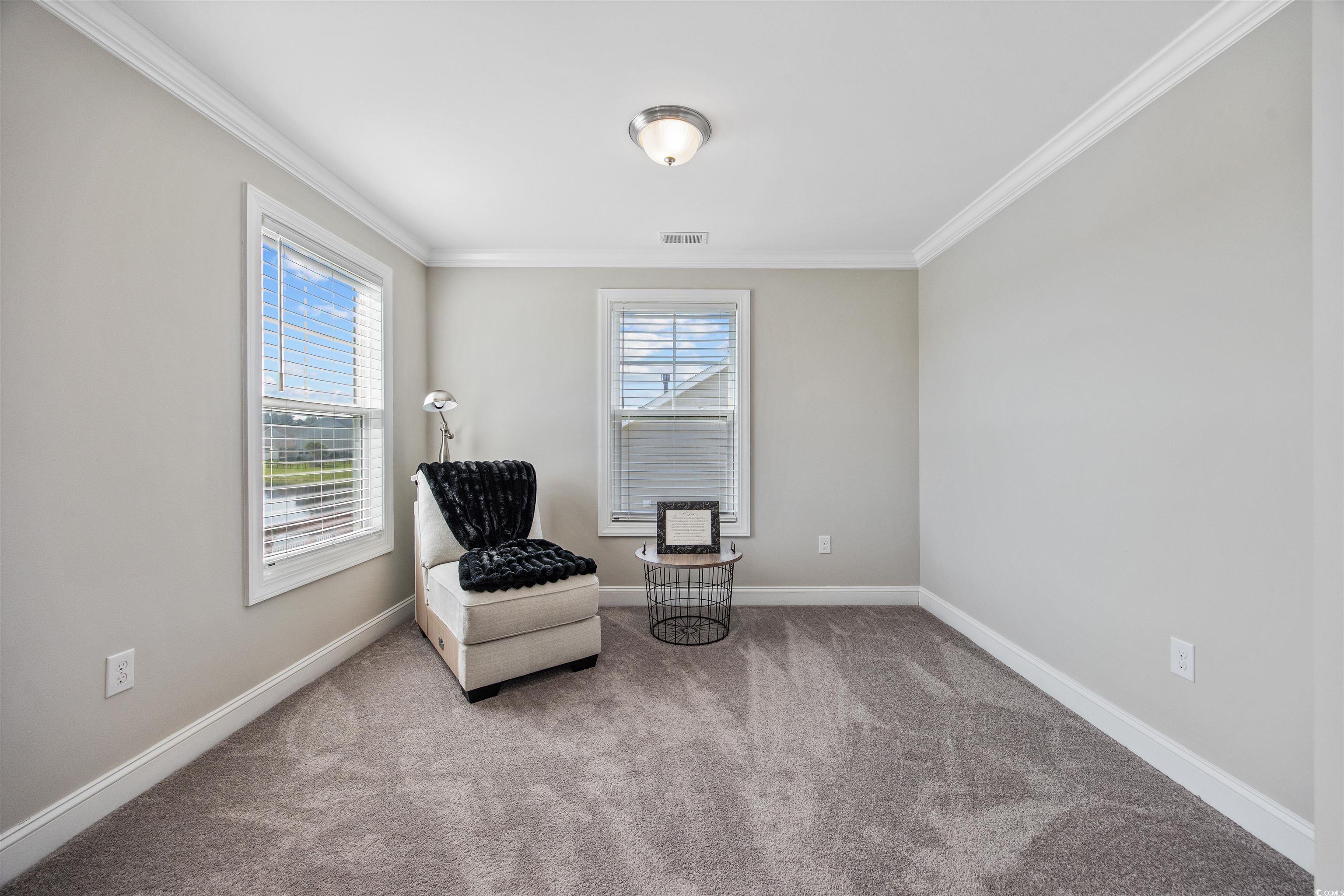 5286 Stockyard Loop Myrtle Beach, SC 29588 - Photo 29 of 40 Sitting room with ornamental molding and carpet floors