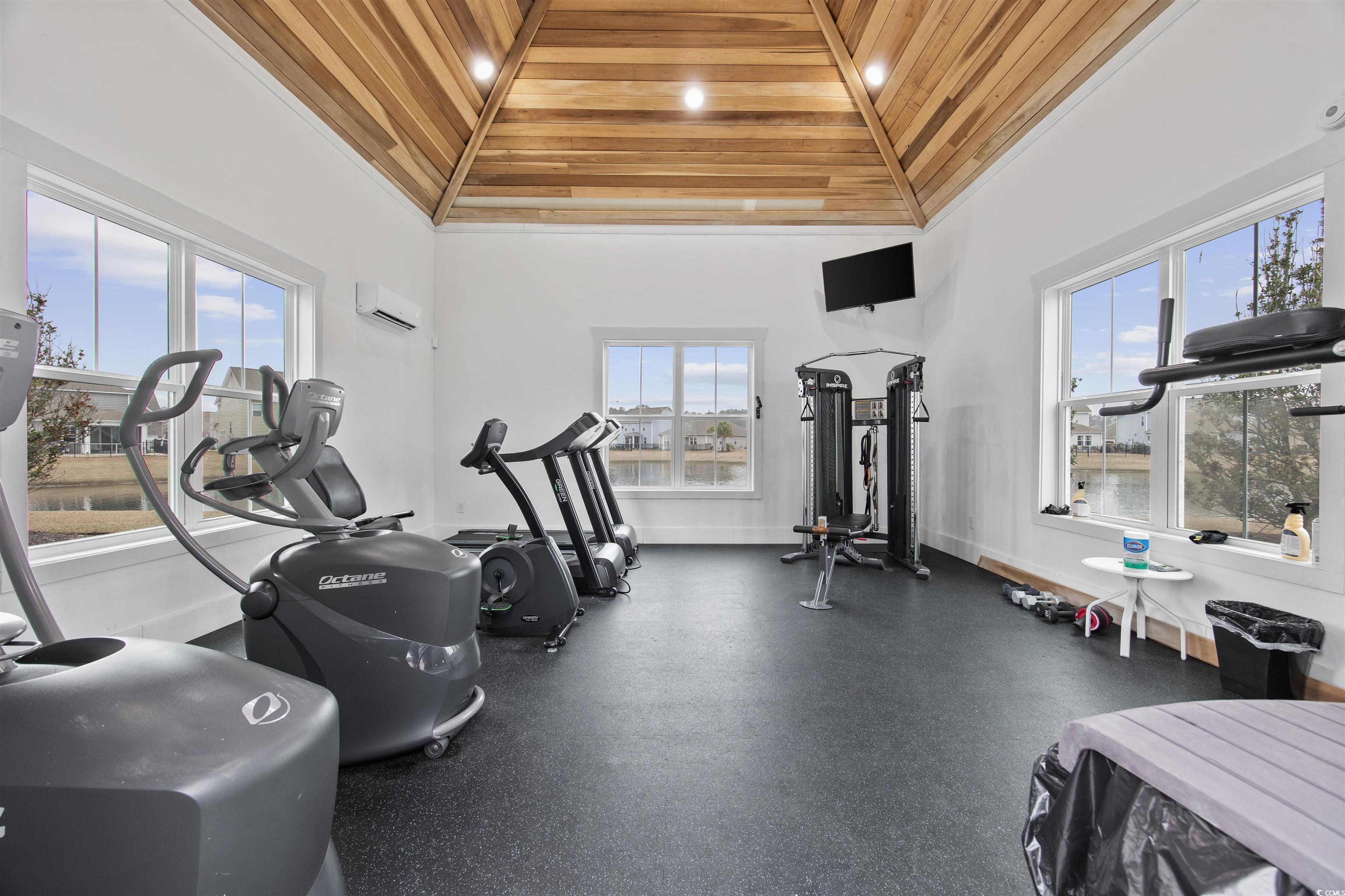 5286 Stockyard Loop Myrtle Beach, SC 29588 - Photo 39 of 40 Workout area featuring wooden ceiling, healthy amount of natural light, a towering ceiling, and recessed lighting