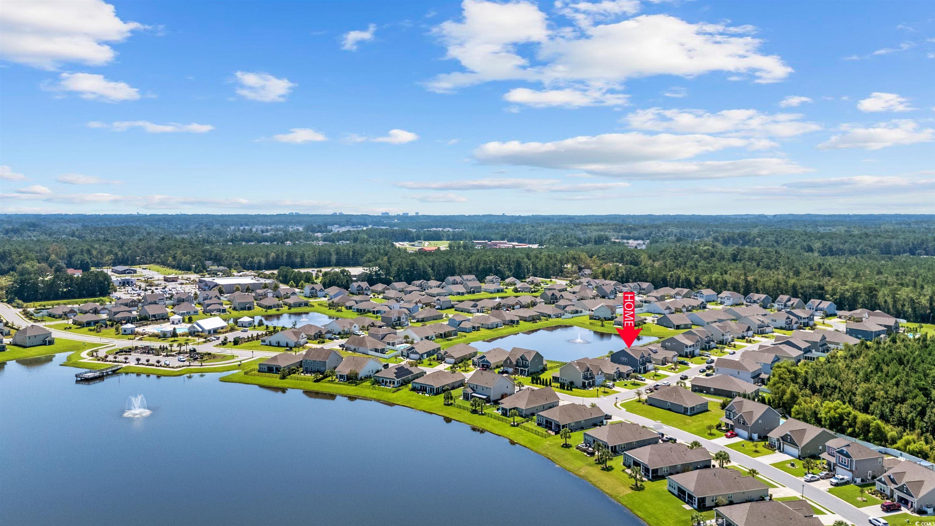 Aerial view of residential area with a nearby body of water