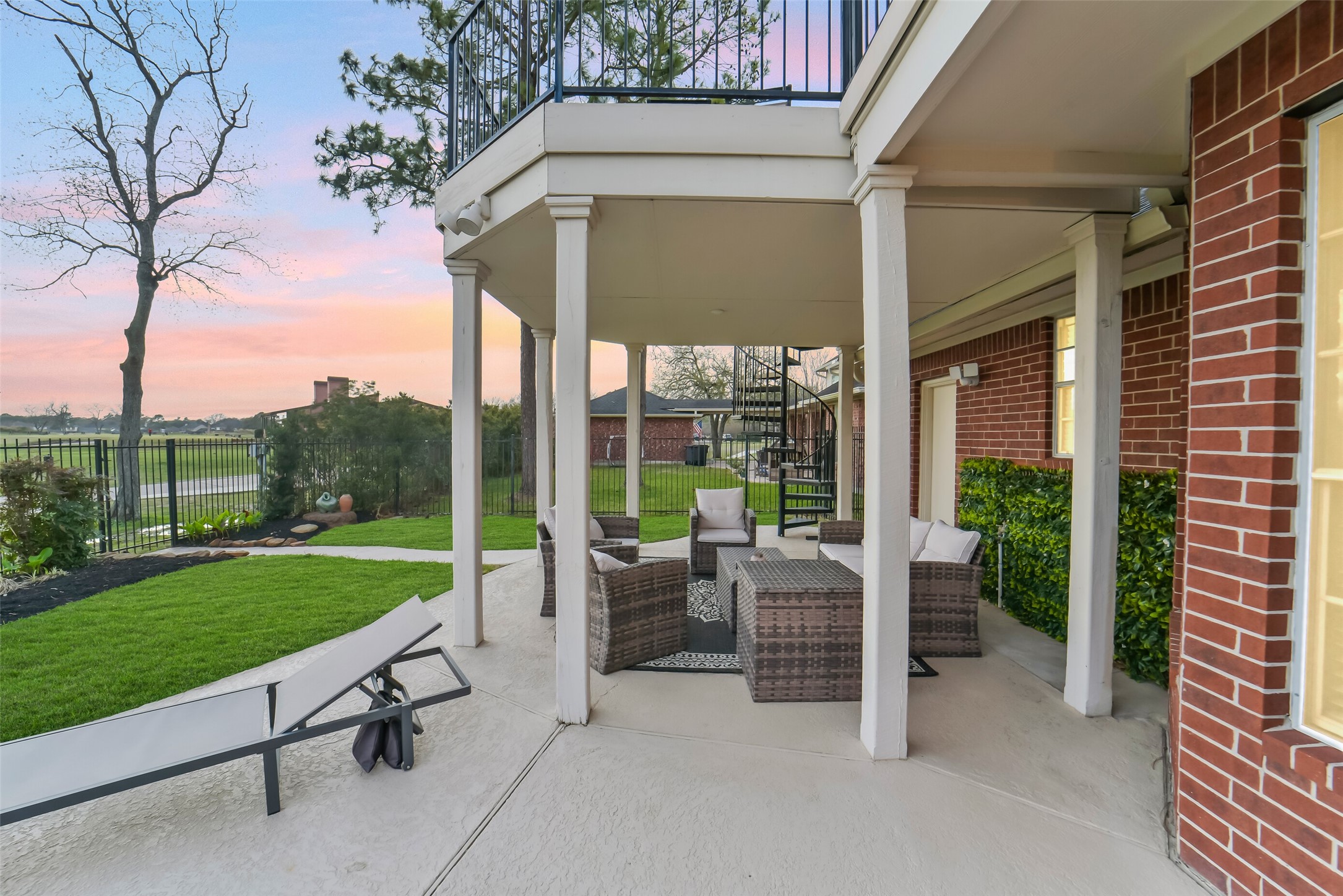 24403 Falcon Point Drive Katy, TX 77494 - Photo 31 of 32 Spacious covered patio area, perfect for lounging in the shade or hosting summer BBQs.