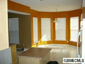 5603 Falls Ridge Lane Charlotte, NC 28269 - Photo 2 of 5 a view of a bedroom with window