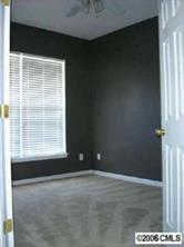 5603 Falls Ridge Lane Charlotte, NC 28269 - Photo 5 of 5 a view of an empty room with a window