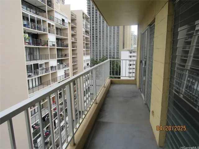 a view of empty room with floor to ceiling window