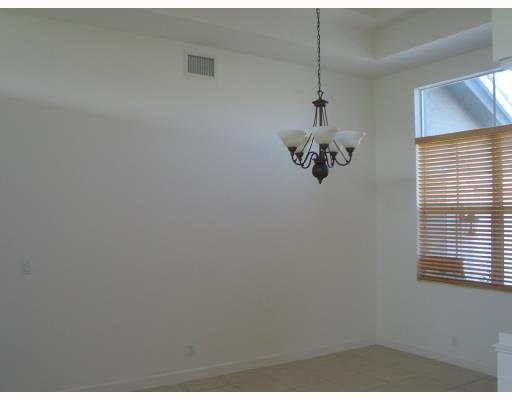 755 Southwest River Bend Circle Stuart, FL 34997 - Photo 6 of 8 a view of a hallway with a window