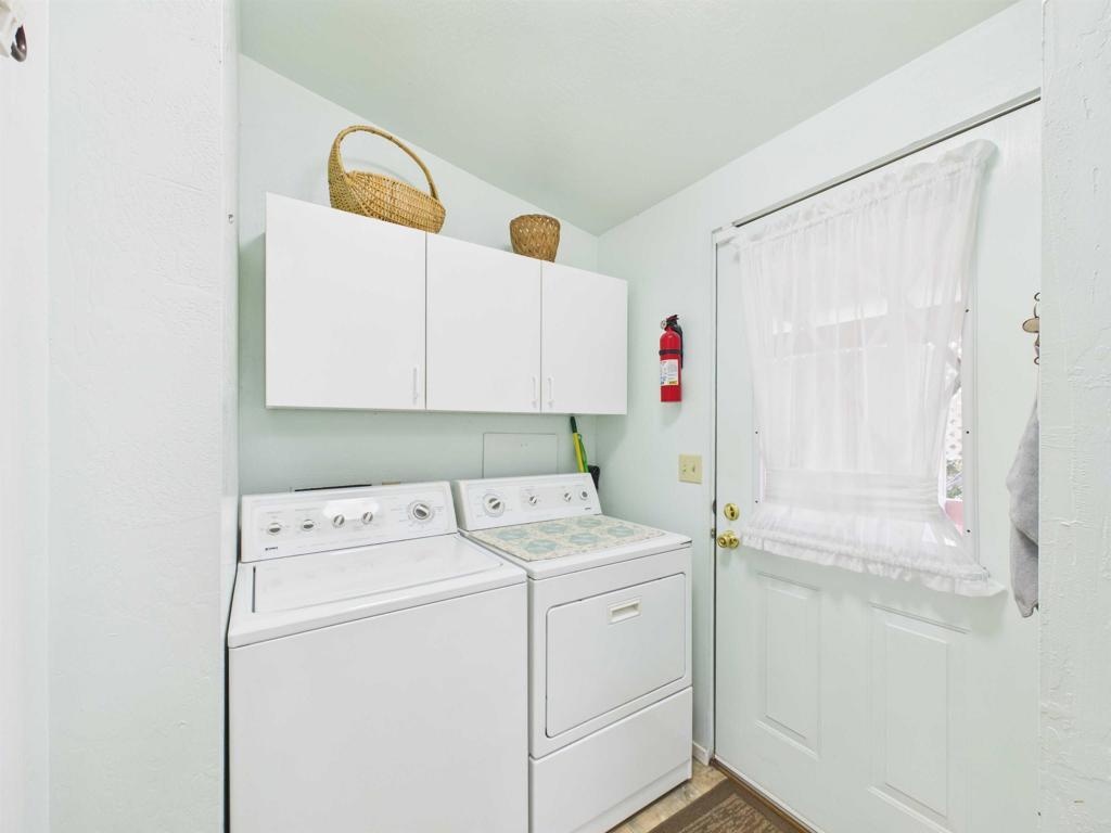 18218 Paradise Mountain Road, Unit 220 Valley Center, CA 92082 - Photo 38 of 48 a utility room with dryer and washer