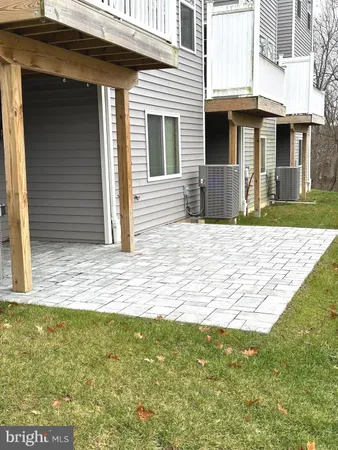 a view of house with yard