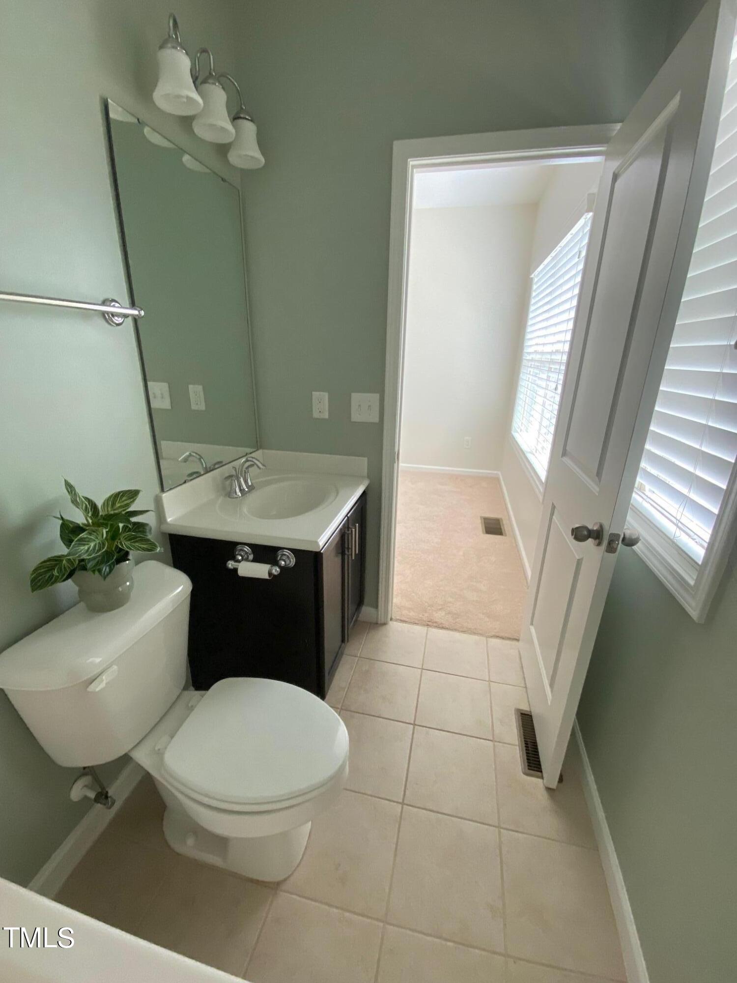 1571 Rodessa Run Raleigh, NC 27607 - Photo 21 of 25 Guest Bath