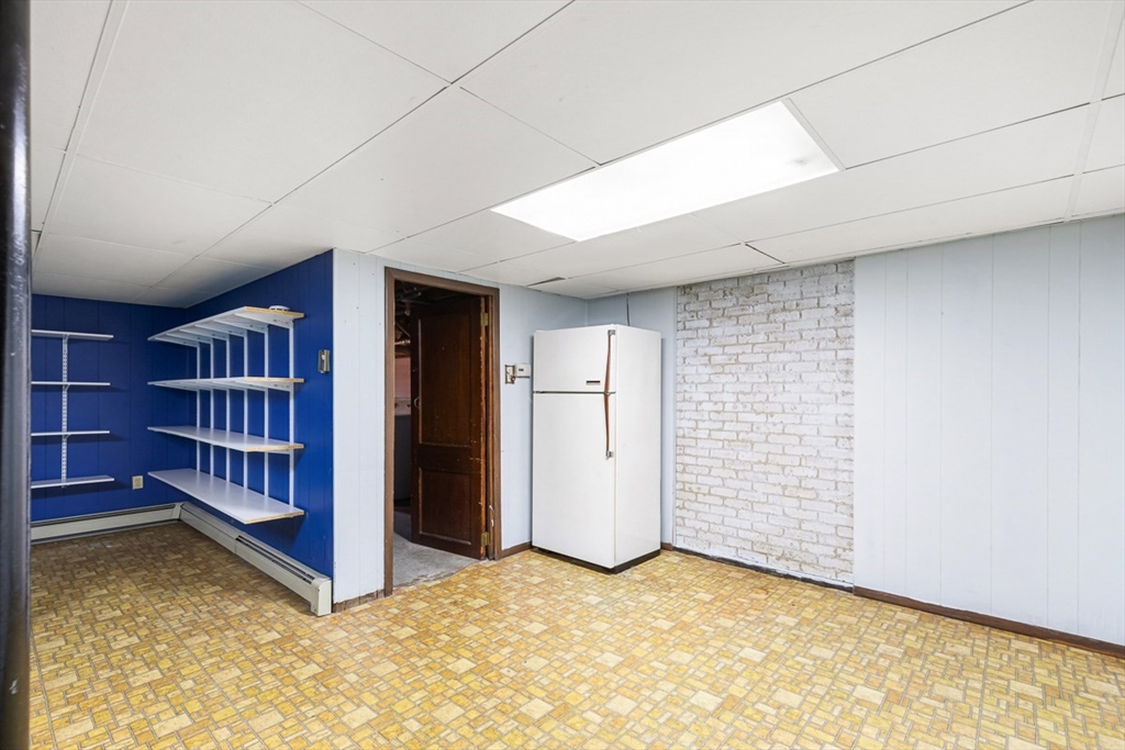 99 Swansom Road Swansea, MA 02777 - Photo 31 of 42 an empty room with shelves