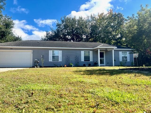 a house view with swimming pool in front of it