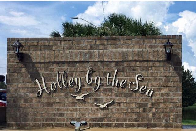 1860 Eagle Lane Navarre, FL 32566 - Photo 2 of 34 a view of a street sign