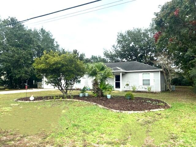 1860 Eagle Lane Navarre, FL 32566 - Photo 30 of 34 a view of a house with a yard and tree s