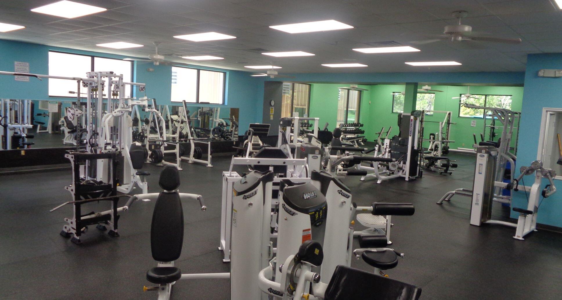 1860 Eagle Lane Navarre, FL 32566 - Photo 33 of 34 a view of a room with gym equipment