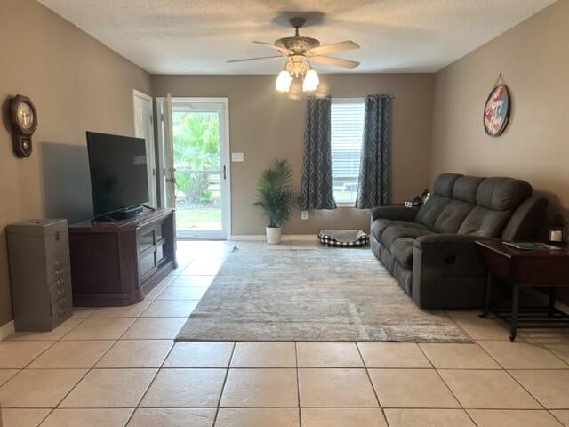 1860 Eagle Lane Navarre, FL 32566 - Photo 4 of 34 a living room with furniture and a flat screen tv