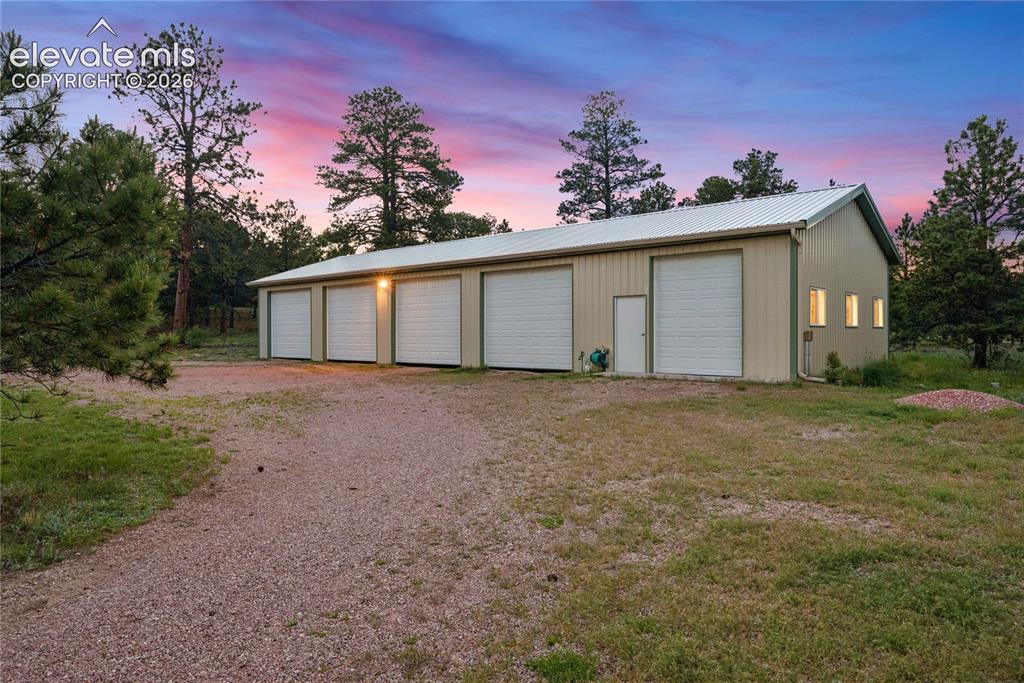 10840 Vollmer Road Colorado Springs, CO 80908 - Photo 41 of 49 front view of a house with a yard