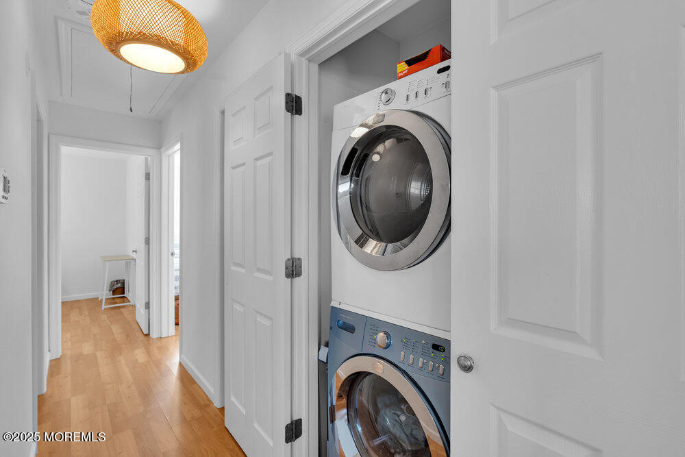 234 3rd Avenue Manasquan, NJ 08736 - Photo 20 of 25 a view of a hallway with washer and dryer