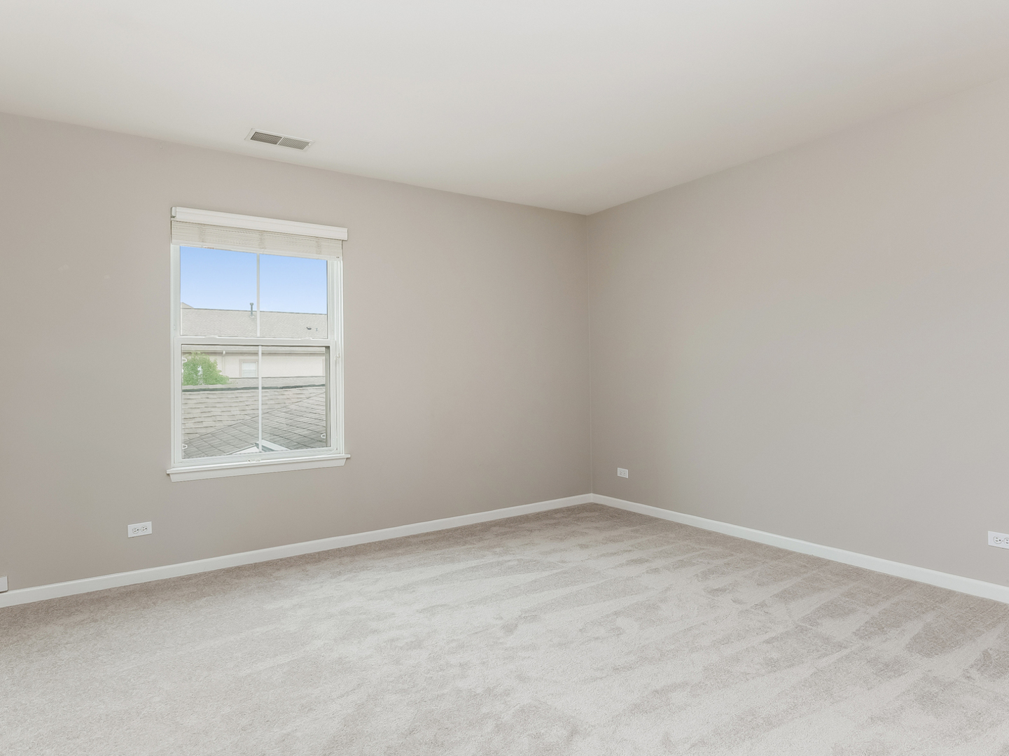 1940 Brentwood Road Northbrook, IL 60062 - Photo 15 of 22 an empty room with a window
