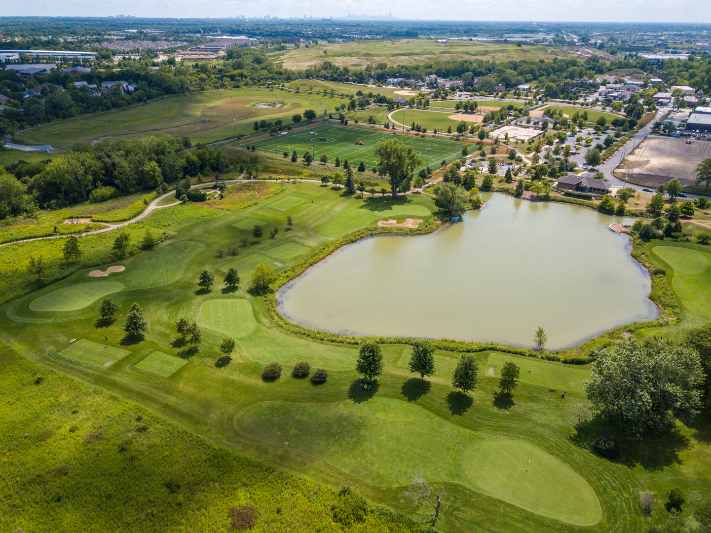 1940 Brentwood Road Northbrook, IL 60062 - Photo 20 of 22 a view of a lake with a mountain