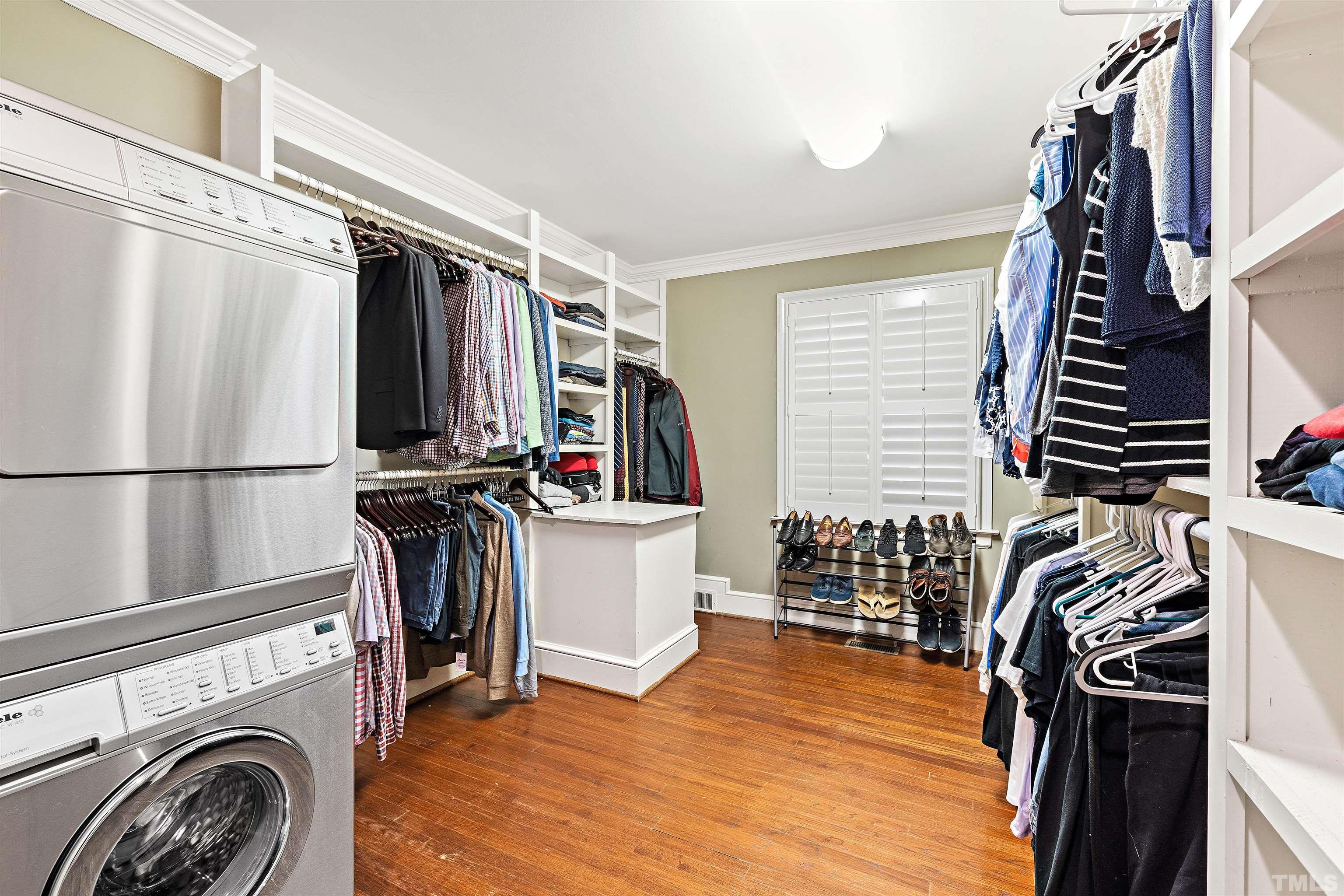 1419 Lutz Avenue Raleigh, NC 27607 - Photo 24 of 56 a view of walk in closet with clothes and shoes