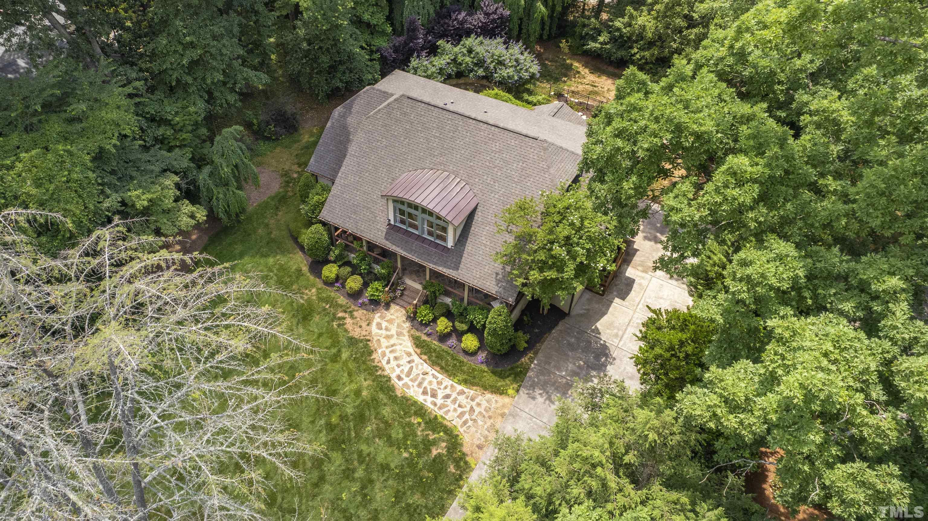 1419 Lutz Avenue Raleigh, NC 27607 - Photo 56 of 56 an aerial view of a house with a yard
