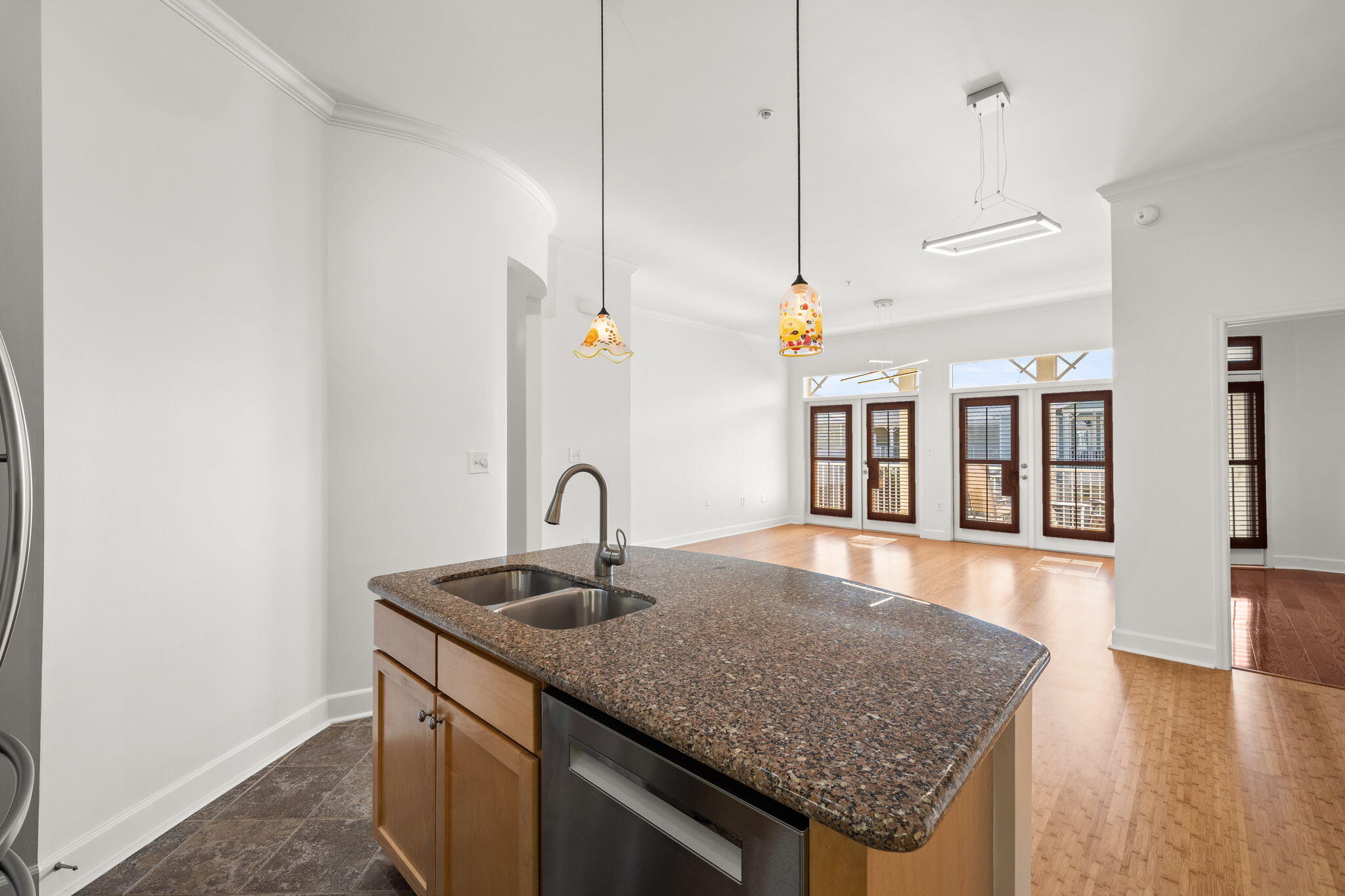 8700 Front Beach Road, Unit 6301 Panama City Beach, FL 32407 - Photo 20 of 82 a kitchen with granite countertop a sink a counter top space and cabinets