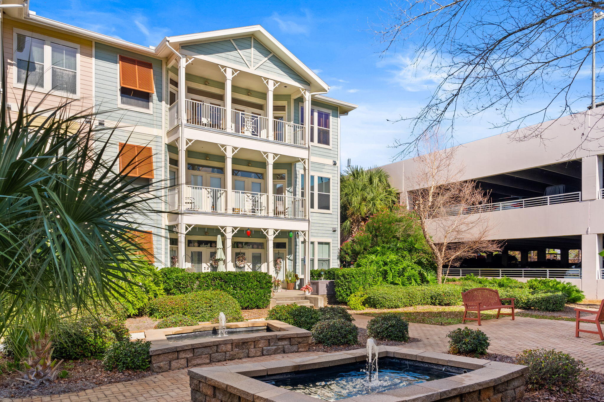 8700 Front Beach Road, Unit 6301 Panama City Beach, FL 32407 - Photo 7 of 82 a front view of a building with a garden and plants