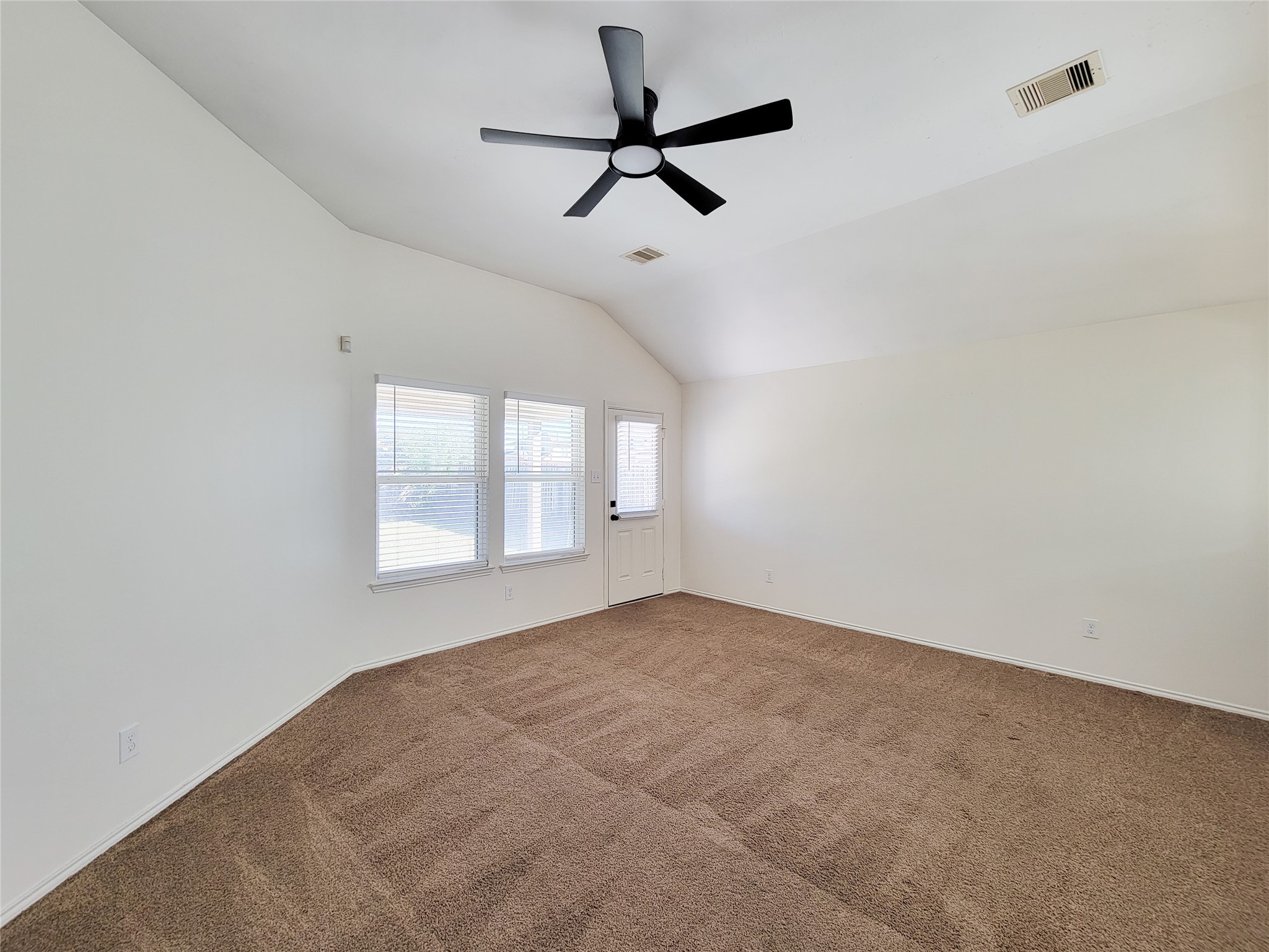 13935 Kenswick Key Lane Houston, TX 77047 - Photo 15 of 33 a view of room with a ceiling fan and window