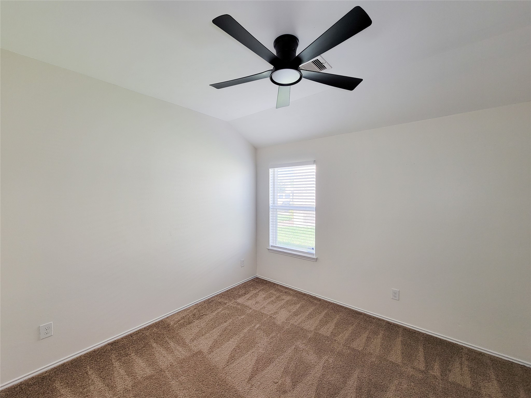 13935 Kenswick Key Lane Houston, TX 77047 - Photo 25 of 33 a view of an empty room with a window