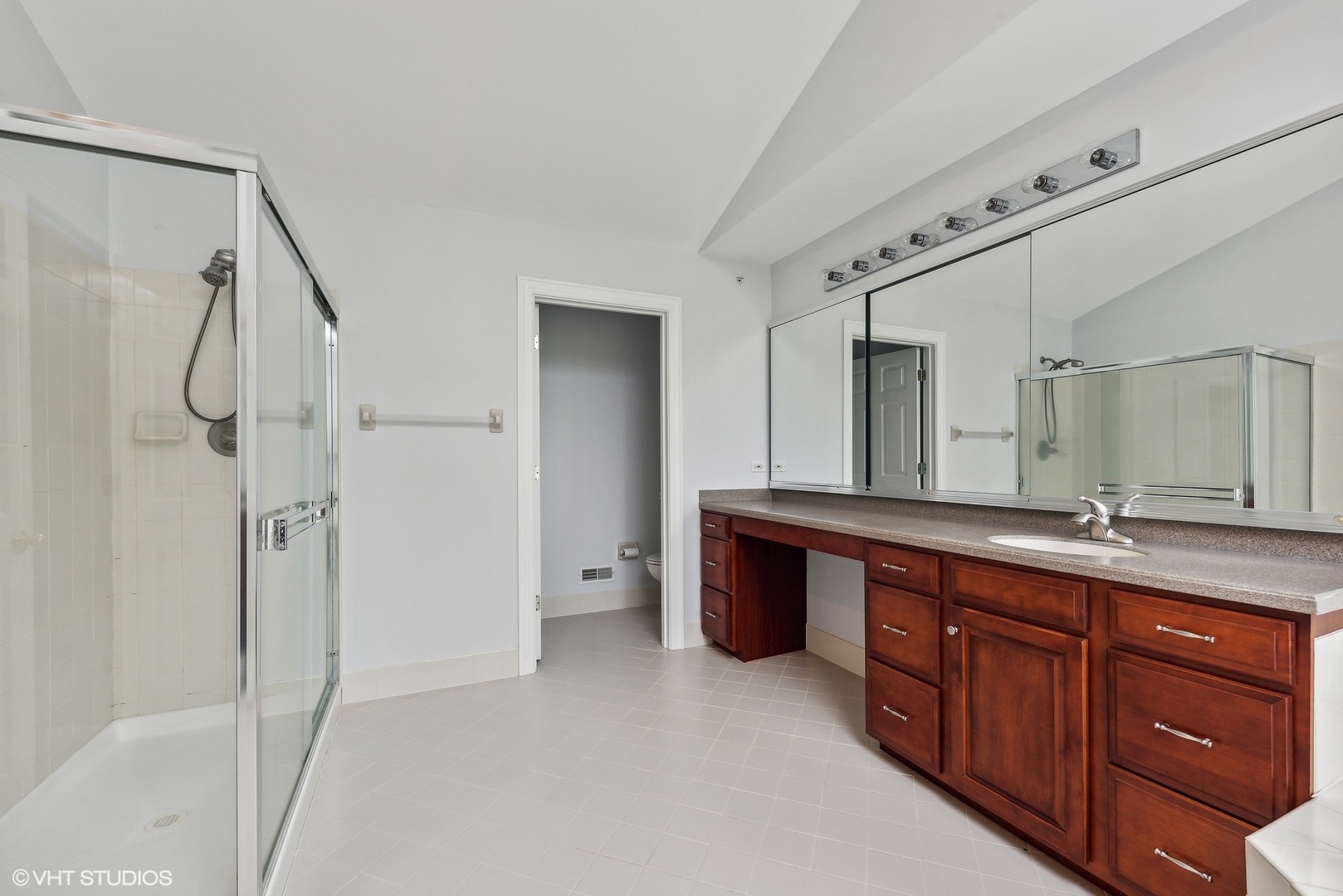 23914 Hillfarm Road Lake Barrington, IL 60010 - Photo 22 of 43 a spacious bathroom with a granite countertop sink mirror and a bathtub