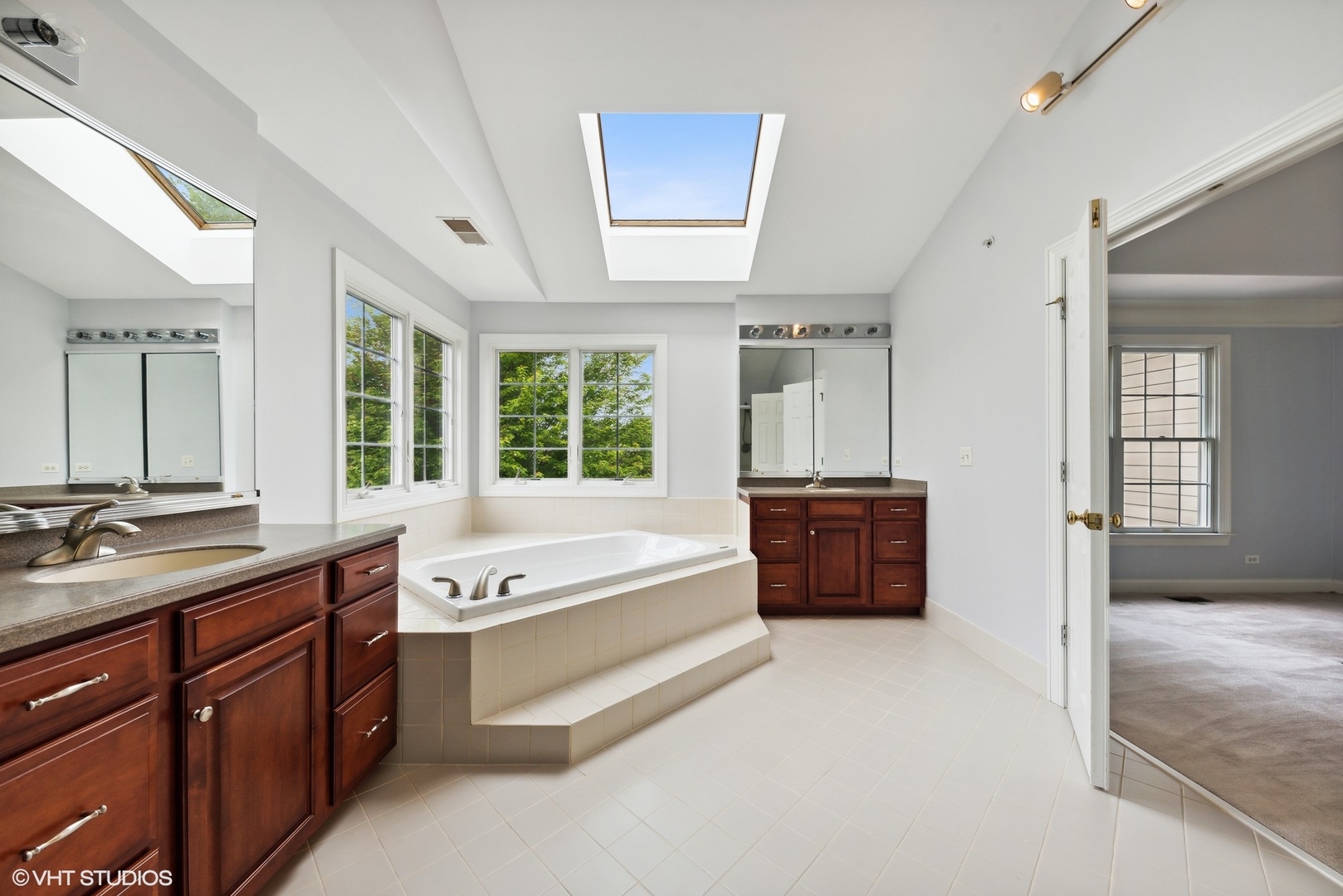 23914 Hillfarm Road Lake Barrington, IL 60010 - Photo 23 of 43 a spacious en suite bathroom with a large tub and sink