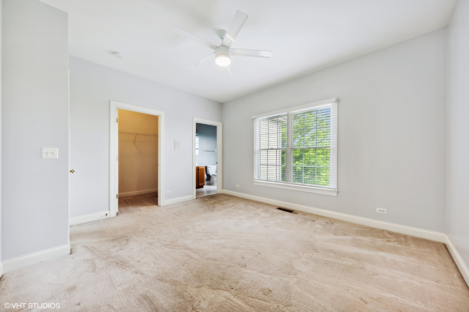23914 Hillfarm Road Lake Barrington, IL 60010 - Photo 27 of 43 an empty room with windows and a ceiling fan