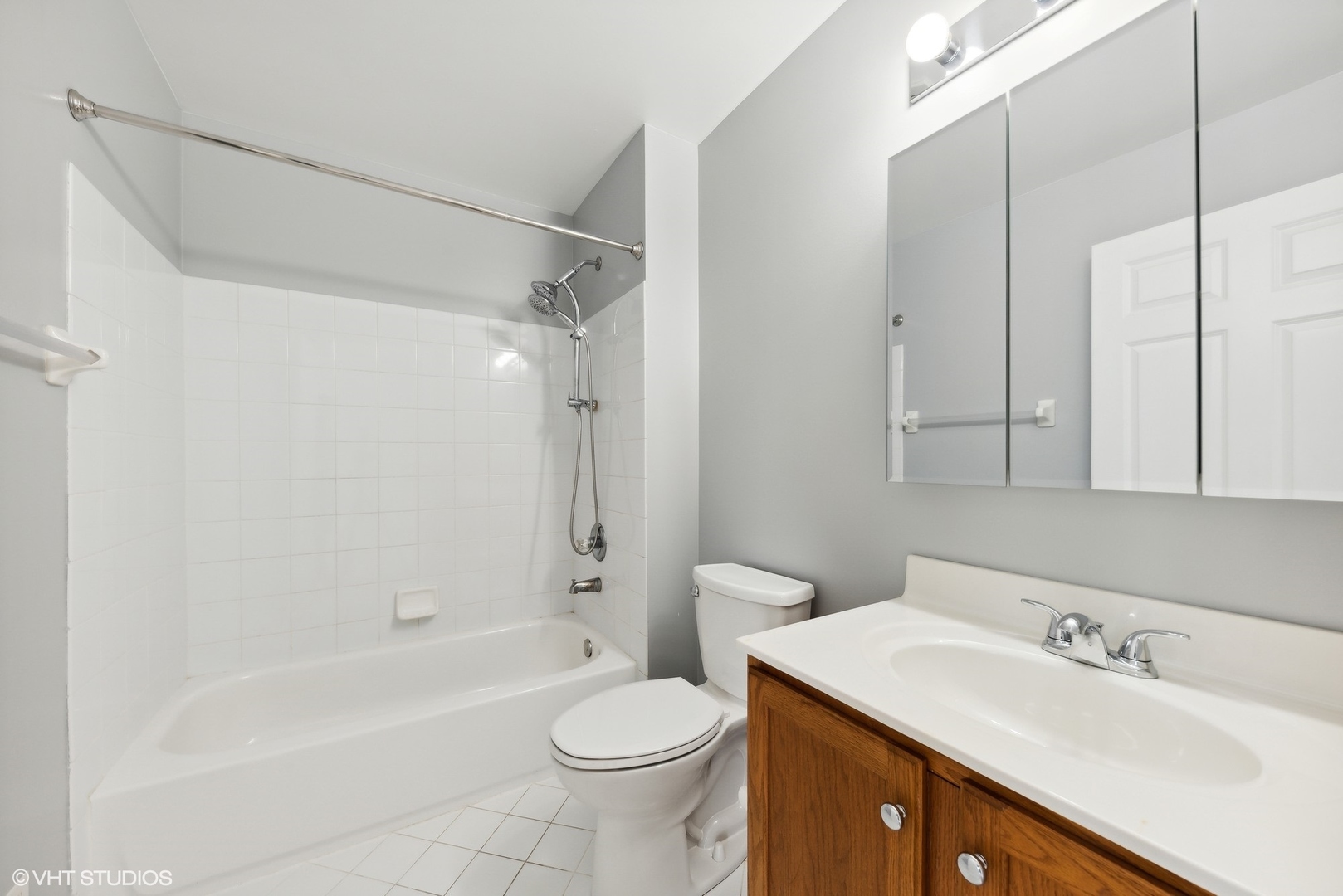 23914 Hillfarm Road Lake Barrington, IL 60010 - Photo 30 of 43 a bathroom with a sink toilet vanity and shower