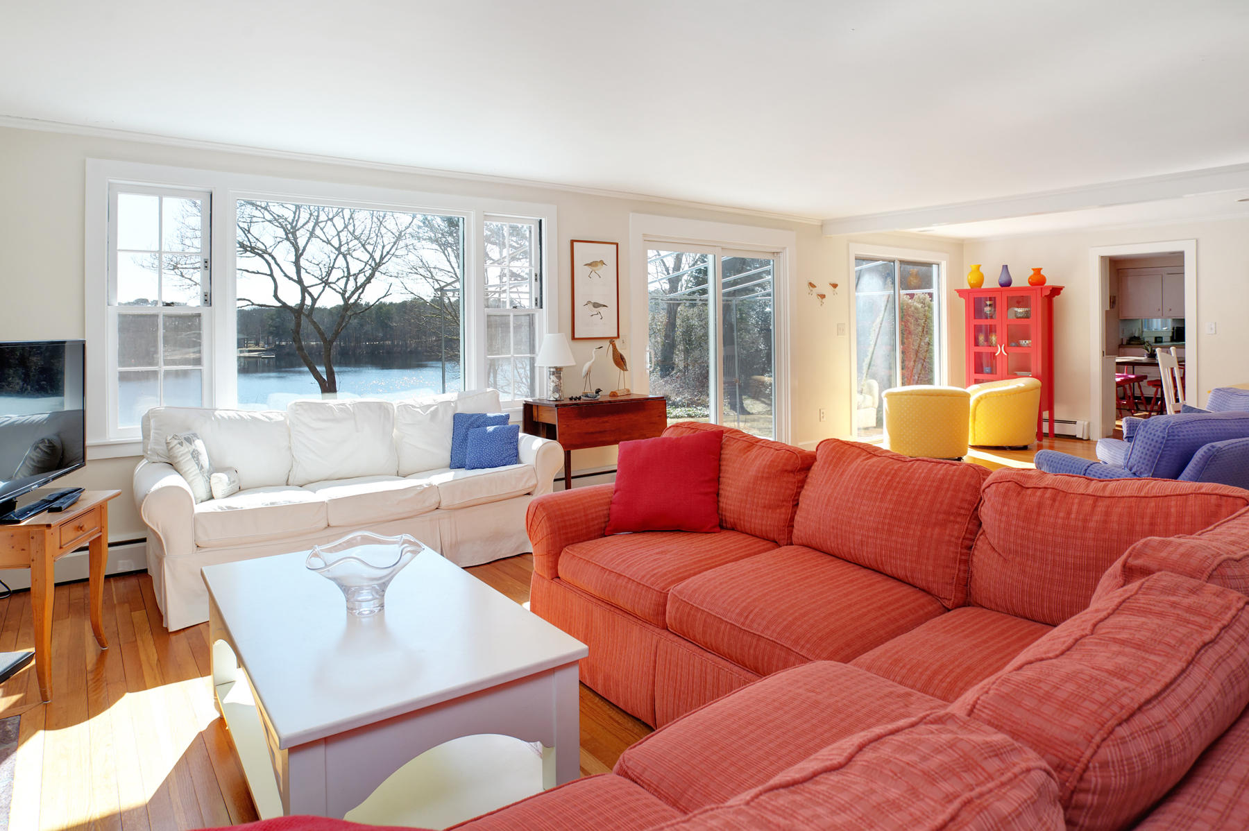 247 Crystal Lake Road Osterville, MA 02655 - Photo 14 of 34 a living room with furniture and a large window