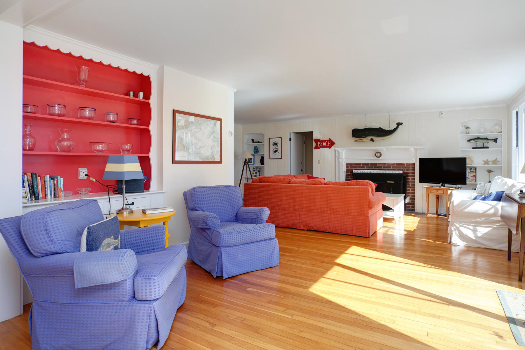 247 Crystal Lake Road Osterville, MA 02655 - Photo 19 of 34 a living room with furniture and a flat screen tv