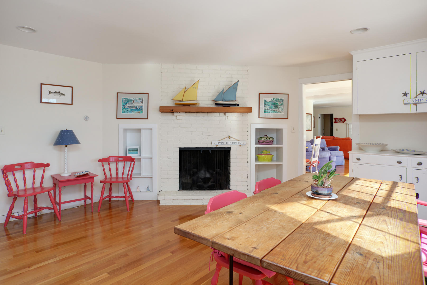 247 Crystal Lake Road Osterville, MA 02655 - Photo 22 of 34 a living room with furniture and a fireplace