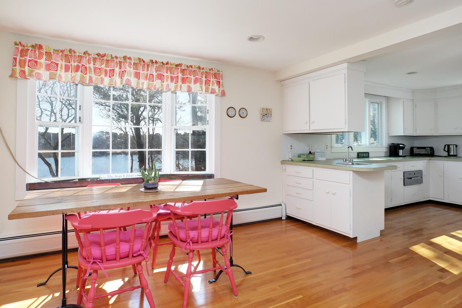 247 Crystal Lake Road Osterville, MA 02655 - Photo 24 of 34 a kitchen that has a cabinets counter space and a sink