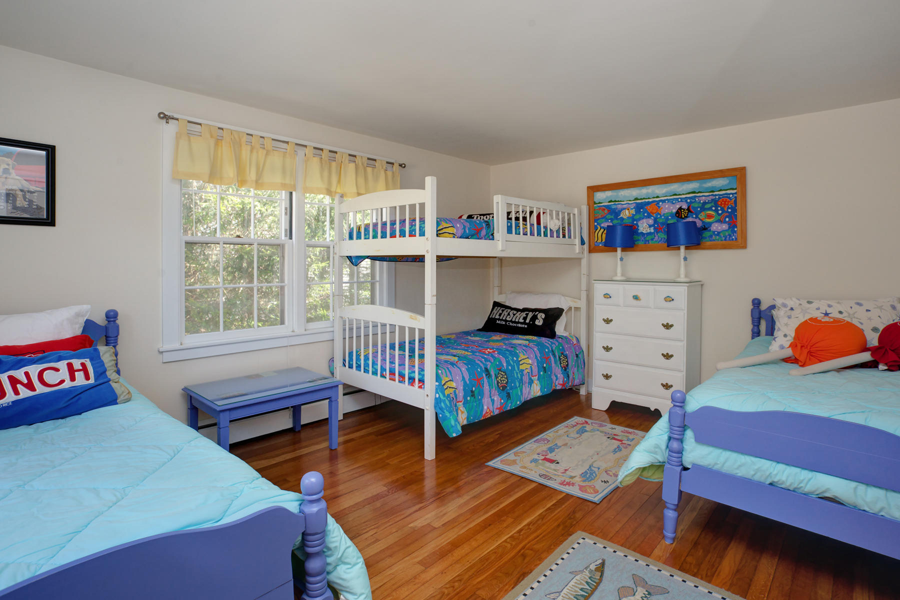 247 Crystal Lake Road Osterville, MA 02655 - Photo 30 of 34 a bedroom with a bed and a window