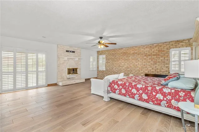 a bedroom with bed and window