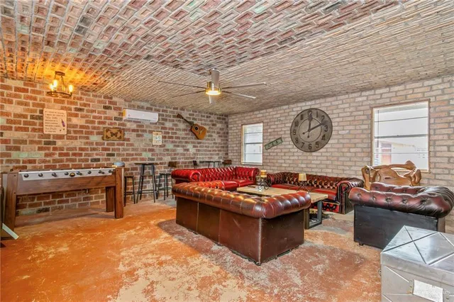 a view of a house with basketball court