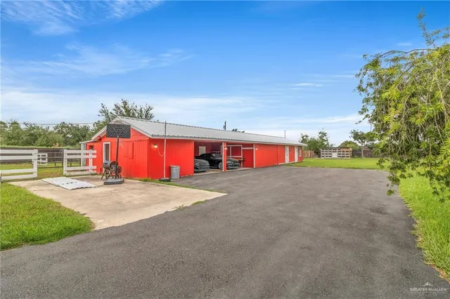 a room with lots of clutter and cabinets