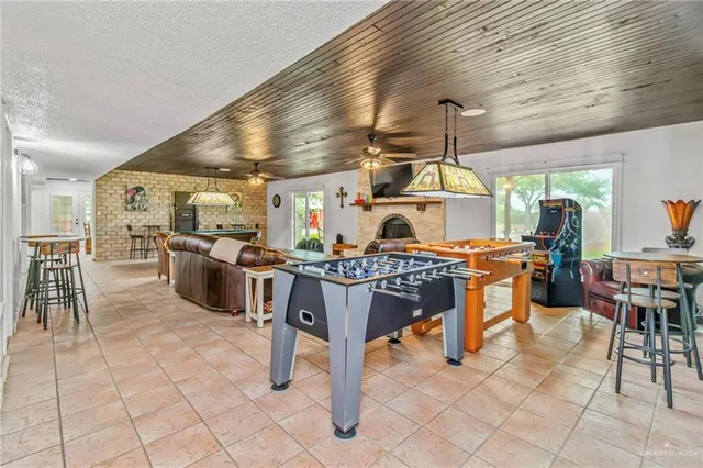 a room with lots of wooden furniture and lots of furniture