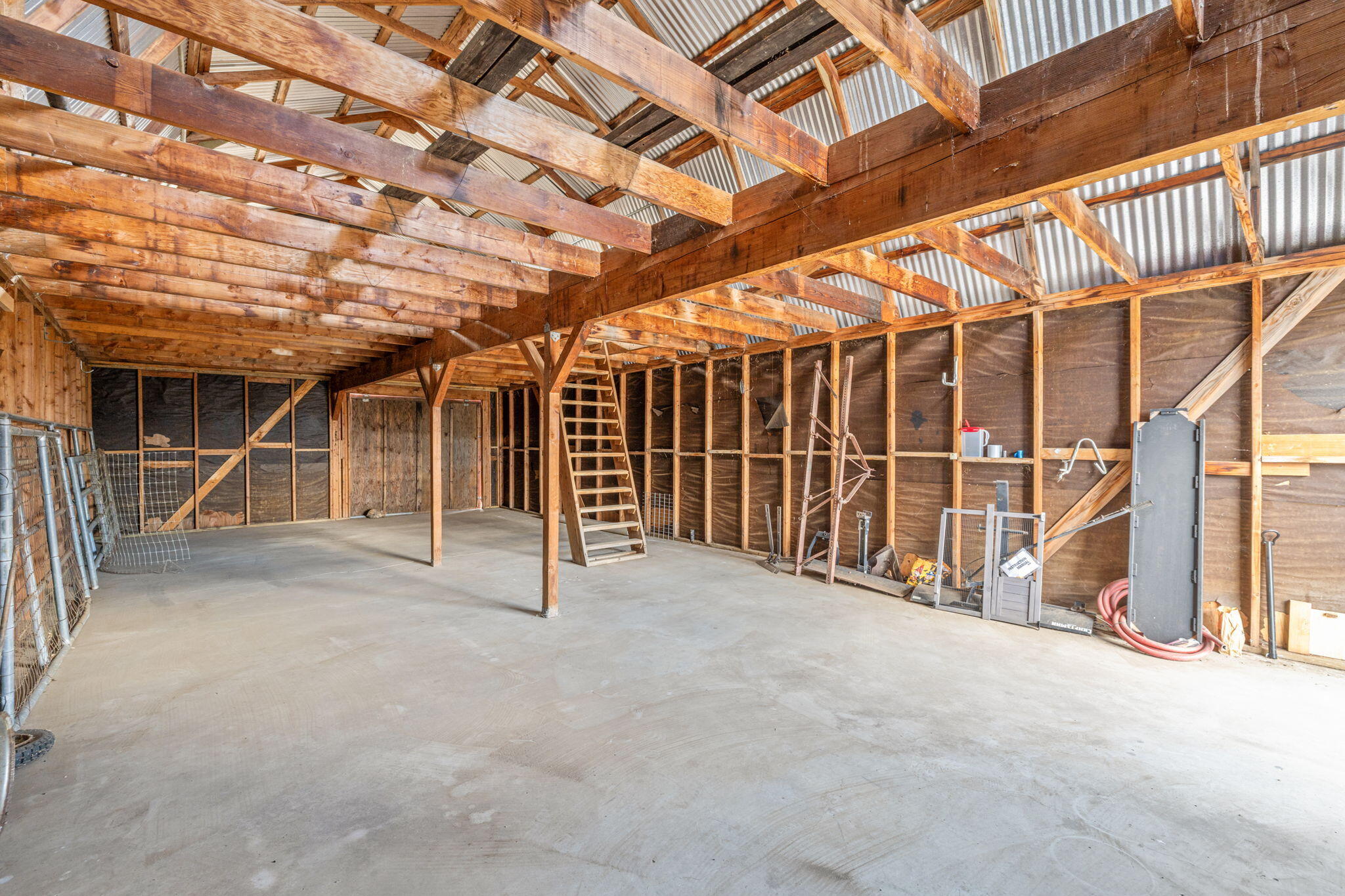 58700 Mica Road Anza, CA 92539 - Photo 12 of 20 a view of an empty room with a staircase