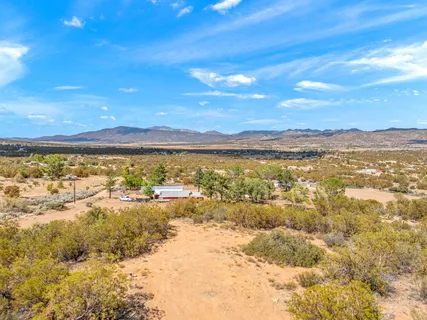 a view of an ocean and a mountain